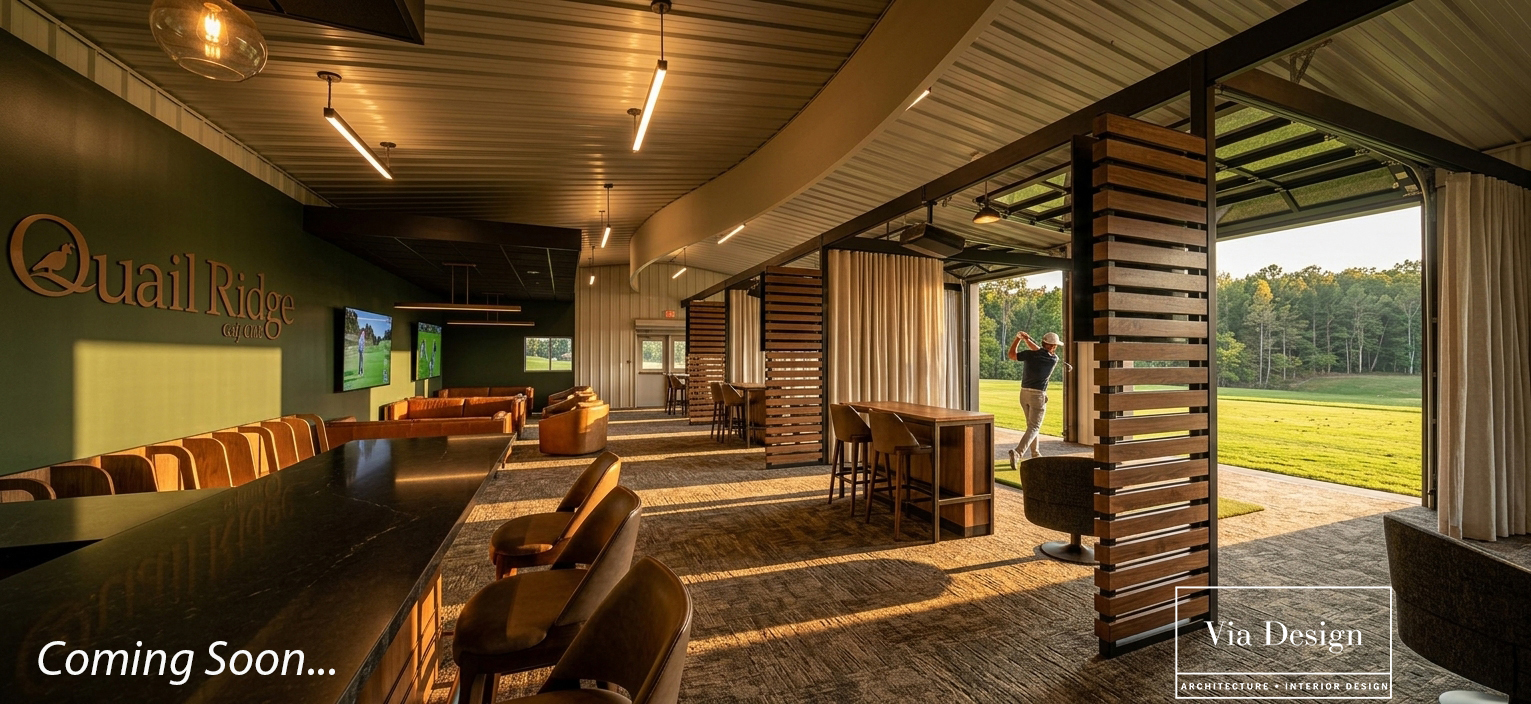 The Nest with bay doors open onto the Quail Ridge driving range